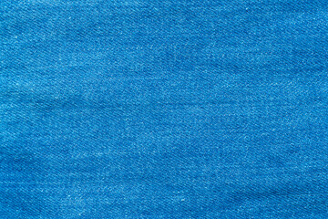 Blue color denim jeans clothes textured background