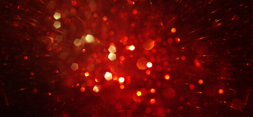 background of abstract gold and black glitter lights. defocused