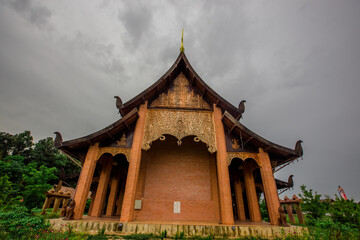 The background of a bridge or a walkway to admire the mountain scenery resembles a Phaya Naga mortgage statue, (Wat Phra Bat Phu Pan Kham) in Khon Kaen Province, Thailand.