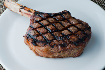 Steak. Grass-fed skirt steak, grilled to a medium rare and served with a garlic herb butter sauce and paired with roasted potatoes and Brussels sprouts. Classic American steakhouse favorite.