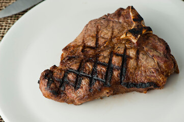 Steak. Grass-fed skirt steak, grilled to a medium rare and served with a garlic herb butter sauce and paired with roasted potatoes and Brussels sprouts. Classic American steakhouse favorite.