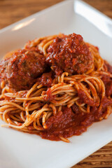 Pasta with meatballs, marinara sauce, Parmesan cheese and fresh Italian parsley. Classic American or Italian restaurant favorite. Homemade pasta with sauces, meats and cheeses.