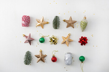 Set of Christmas decorations on light surface. Flat lay