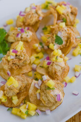 Fried oysters. Fresh oysters fried and served with garlic, shallots, cocktail sauce, mignonette sauce and fresh lemons and limes. Classic American steakhouse or French bistro appetizer.