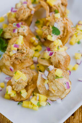 Fried oysters. Fresh oysters fried and served with garlic, shallots, cocktail sauce, mignonette sauce and fresh lemons and limes. Classic American steakhouse or French bistro appetizer.
