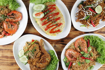 Flat lay of asian food on a wooden background