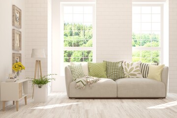 White living room with sofa and summer landscape in window. Scandinavian interior design. 3D illustration