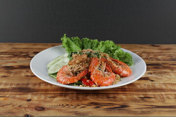 Delicious Prawn Fried Rice with salad and cucumber