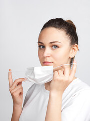 Young woman wearing a medical mask