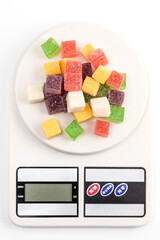 Colored candy bars on a white background