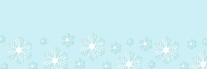 Christmas pattern of white snowflakes on an azure-blue background. Template for design