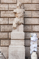 The ancient Hellenistic-style statue ,known as Pasquino, one of the famous talking statues of Rome. It is found in Piazza di Pasquino