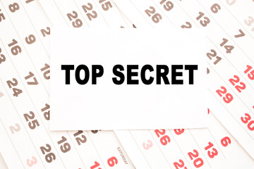 text TOP SECRET on a sheet from Notepad.a digital background. business concept . business and Finance.
