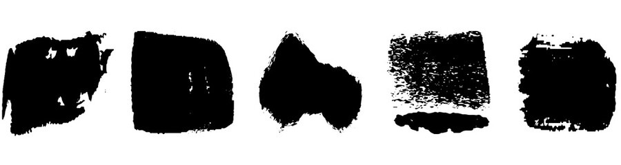 A set of grunge brushes. A collection of ink stains, smudges. Abstract paint strokes isolated on a white background