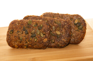 bread  with pumpkin seeds on table.
