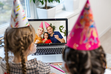 kids having web chat call conference. Remote congratulation of children using Internet technologies.