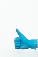 Doctor hand with glove showing like gesture or thumbup as approval, accept or done concept. Copy space. place for text