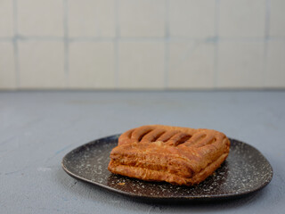 Strudel on a plate on the kitchen table