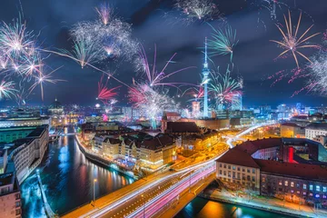 Foto op Plexiglas anti-reflex Display of Fireworks over Berlin Alexanderplatz on New Year's Eve © Daniel