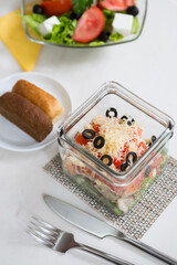 Glass bowl of fresh caesar salad