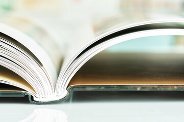 Close-up open book with soft blurred background