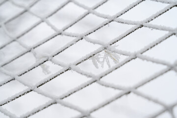 rag net in frost on a white background