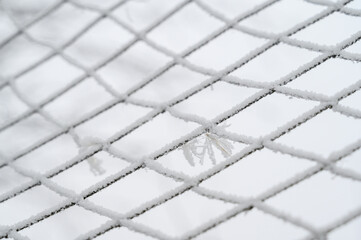 rag net in frost on a white background