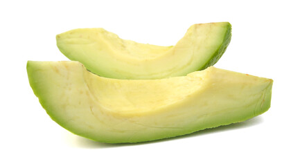 Whole and half avocado isolated on white.
