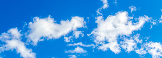 Panorama of blue sky with white clouds