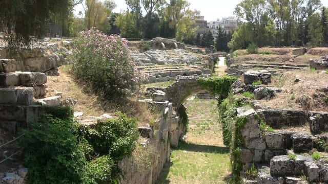 Roman amphitheatre of Syracuse (Siracusa), ruins of ancient monument, Sicily, Italy. Footage 4k