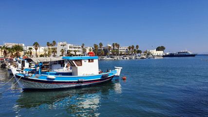Fototapeta na wymiar Boats in the marina in downtown Kos, Greece