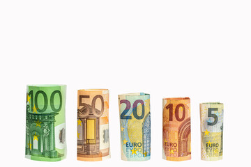 Obraz na płótnie Canvas Gerollte Euro Geldscheine auf Weißen Hintergrund