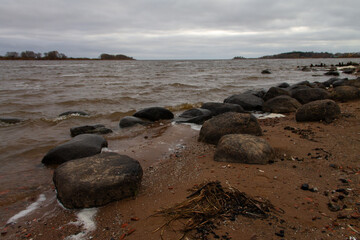 landscape of the sandy river Bank in cloudy weather