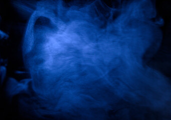 blue smoke on a black background, fog on a dark background