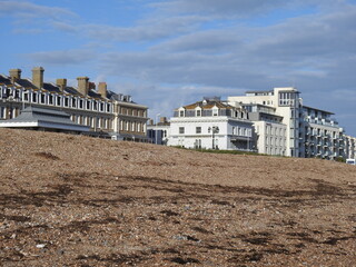 Pebble beach and buildings