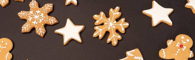 top view of gingerbread cookies on black background, 
