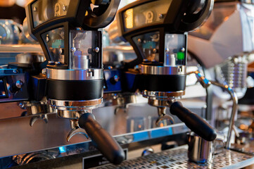 Close up of wood and still lever espresso machine