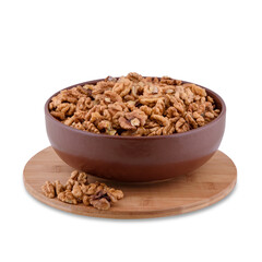 Walnuts in brown bowl on wood board isolated on white background, copy space.