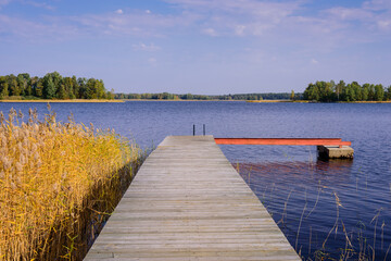Beautiful landscape with a lake and a boat dock. Vuoksa lake - a picturesque lake in Leningradskaya oblast, Russia