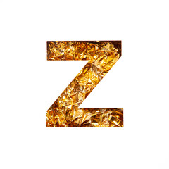 Gold letter Z of English alphabet of shiny foil and paper cut isolated on white. Festive golden...