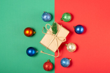 Bright gift boxes and Christmas decorations, on a green background. Top view, holiday and Christmas concept.