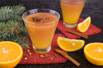 
Mulled wine with red wine orange juice and spices. Christmas drinks concept.