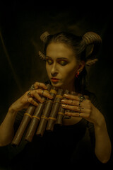 Faun with panflute - obrazy, fototapety, plakaty