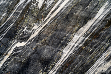 Dark marble stone raw texture. Abstract background