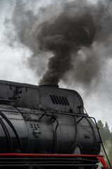 Old retro vintage steam train on platform station Ruskeala Park