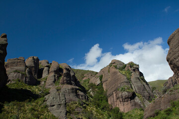 Unique landscape. View of the mountains and rock formations peaks under a deep blue sky in Los Terrones natural reserve in Córdoba, Argentina.