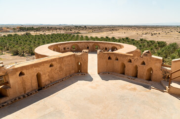 Terrace of the Jabreen Castle with the fields of date palms in background, Oman