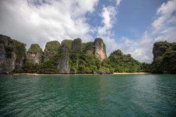 Fototapeta na wymiar Green sea and big green mountains. Beautiful nature landscape. Andaman Sea, Krabi Thailand