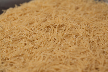 close-up raw noodle kernels