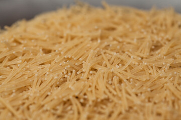 close-up raw noodle kernels